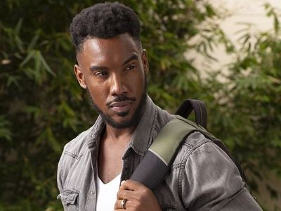 Ernest Pierce is posing with the bag pack in the picture.